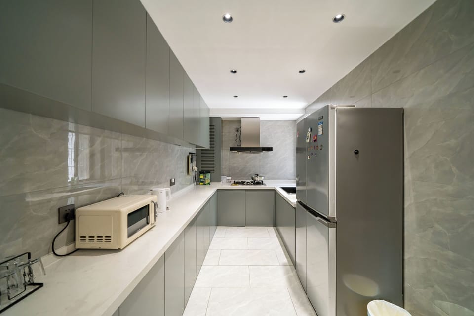 Senior Apartment | Private kitchen | Fridge, cookware/dishes/utensils, paper towels