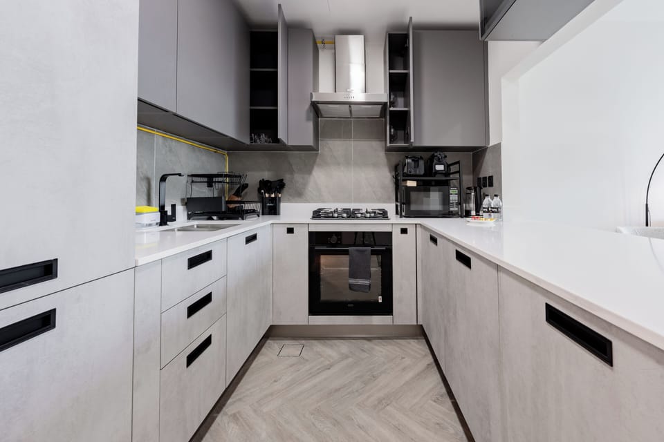 Deluxe Apartment, Balcony, City View | Private kitchen | Espresso maker, electric kettle