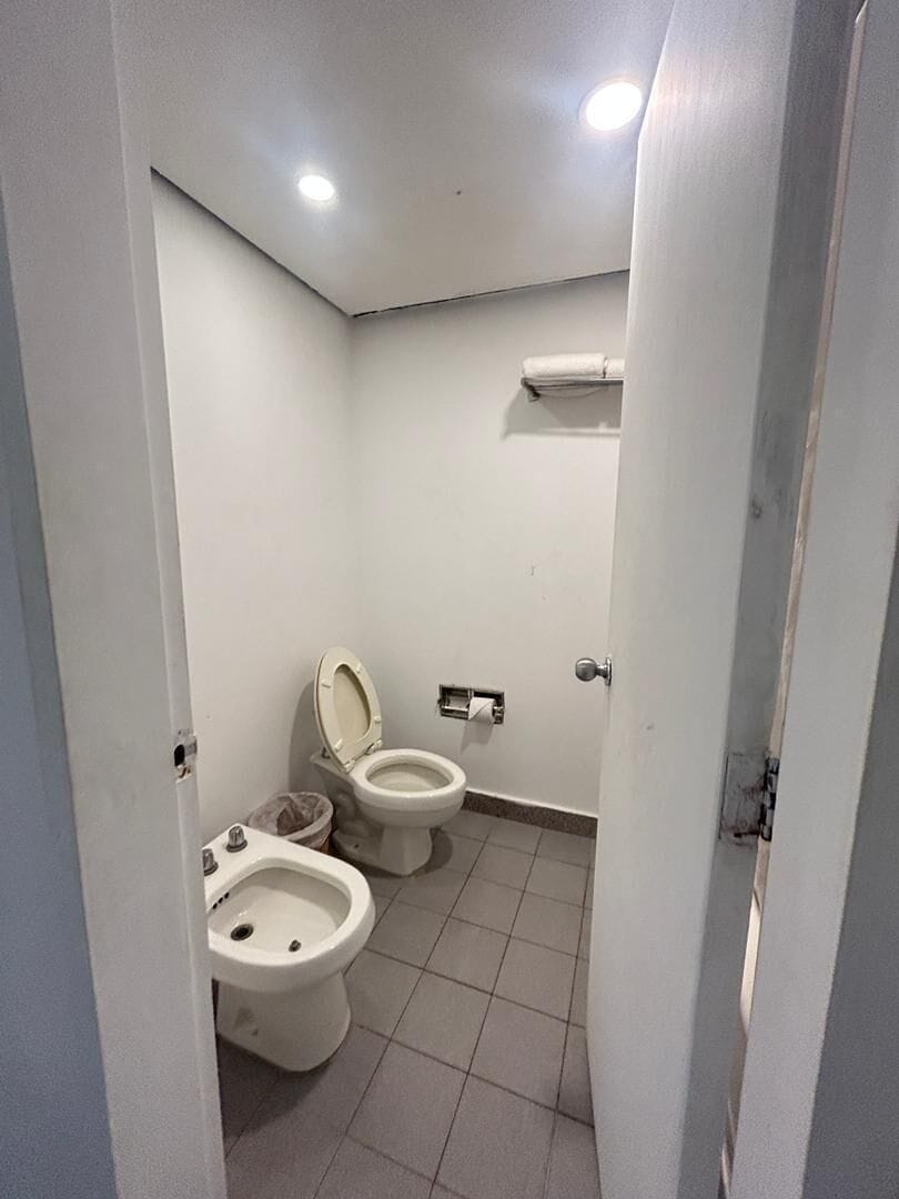 Combined shower/tub, slippers, towels, soap