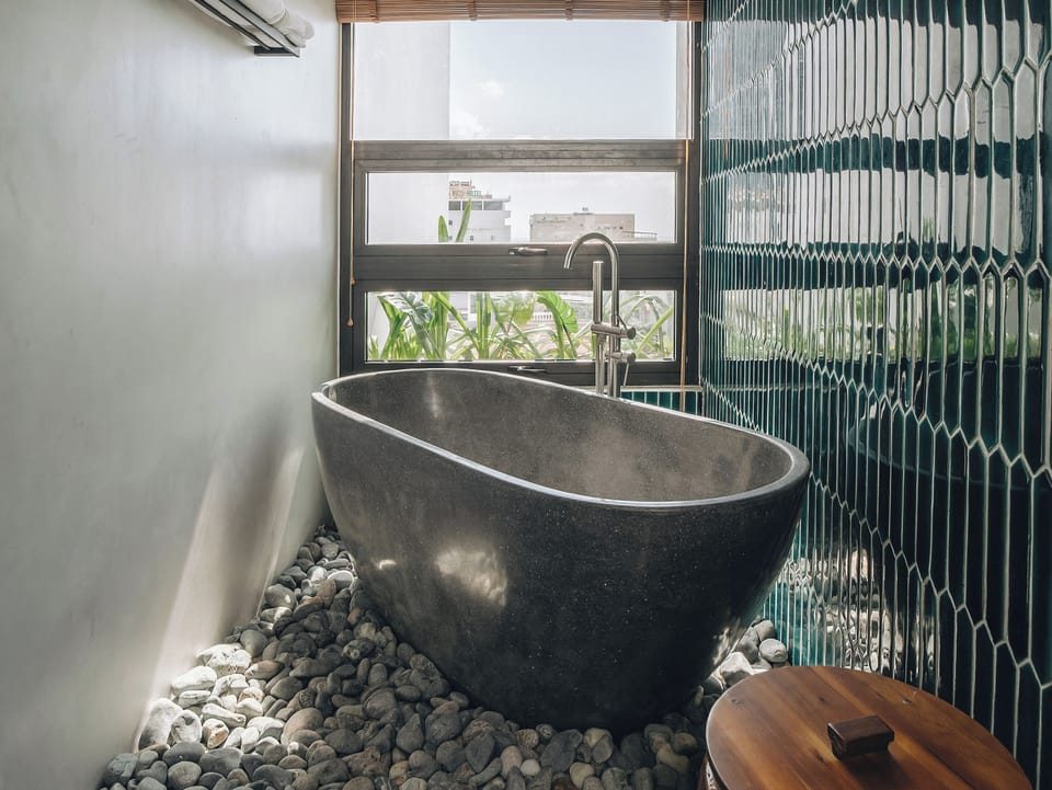 Premier Double Room, Bathtub | Bathroom | Separate tub and shower, rainfall showerhead, hair dryer, slippers