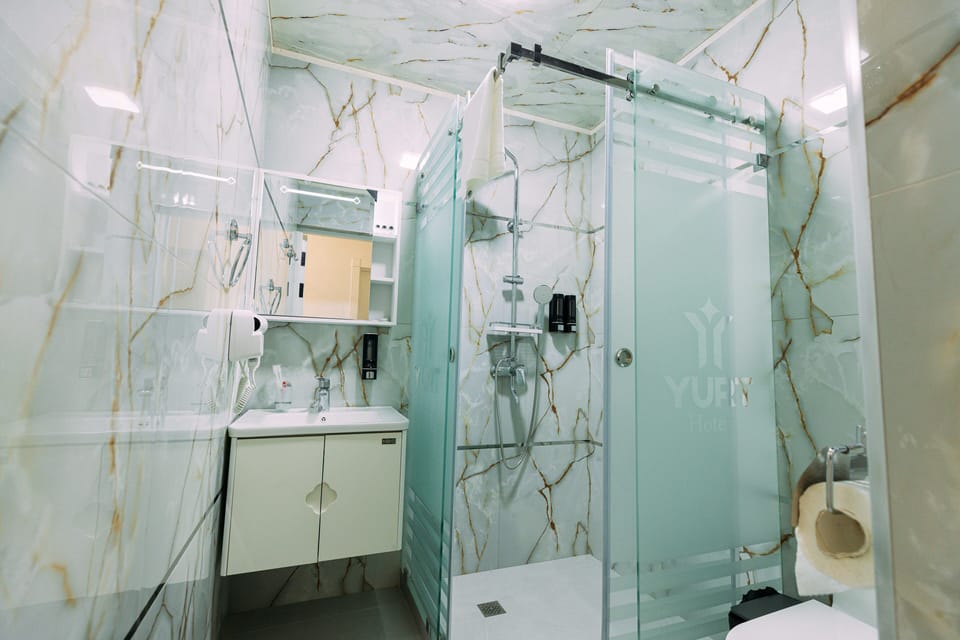 Shower, free toiletries, hair dryer, bathrobes