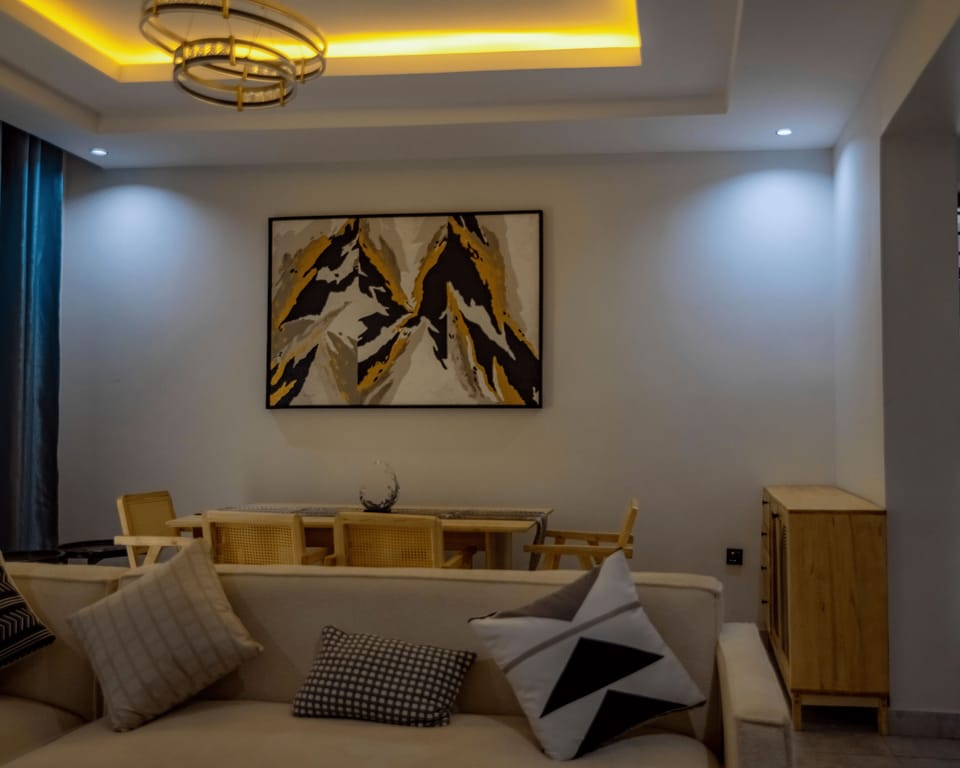 Deluxe Apartment, Balcony | Living area | TV