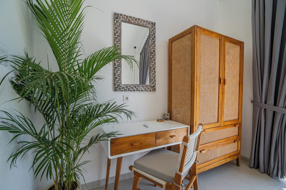 Deluxe Villa, Pool View | In-room safe, desk, laptop workspace, soundproofing