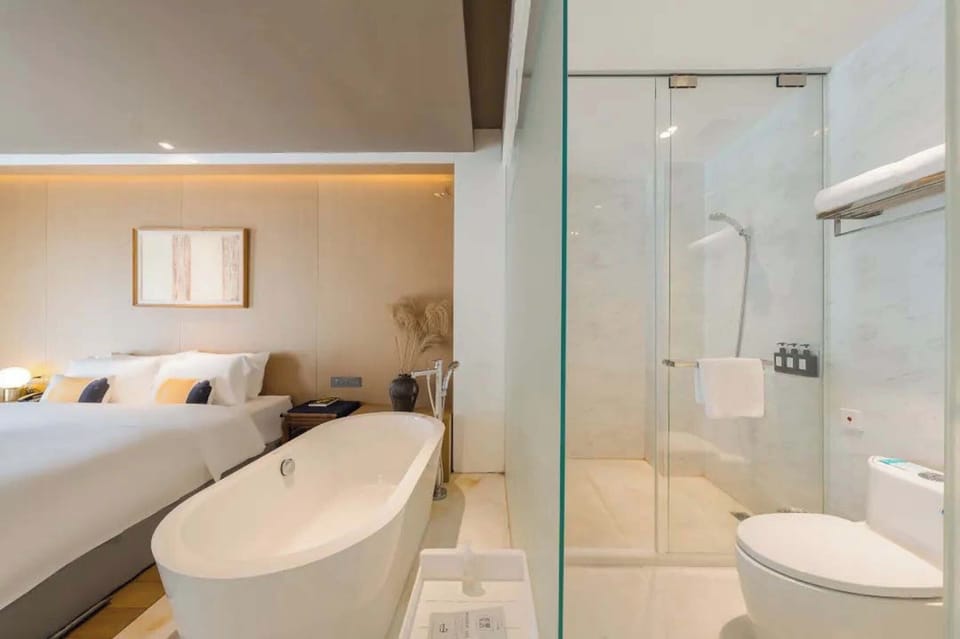 Luxury Suite, City View | Bathroom | Shower, free toiletries, hair dryer, slippers