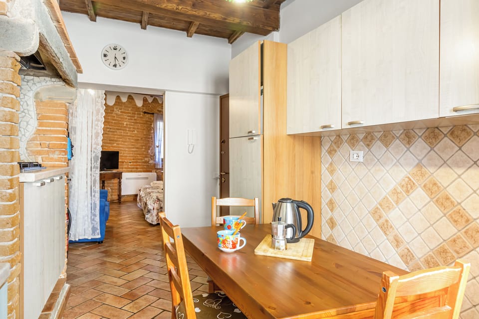 Fridge, electric kettle, toaster, cookware/dishes/utensils
