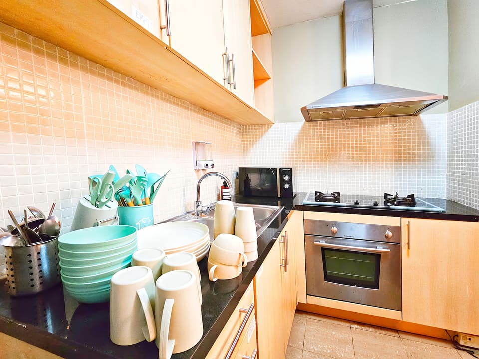 Apartment, 2 Bedrooms, City View | Private kitchen | Fridge, microwave, stovetop, cookware/dishes/utensils
