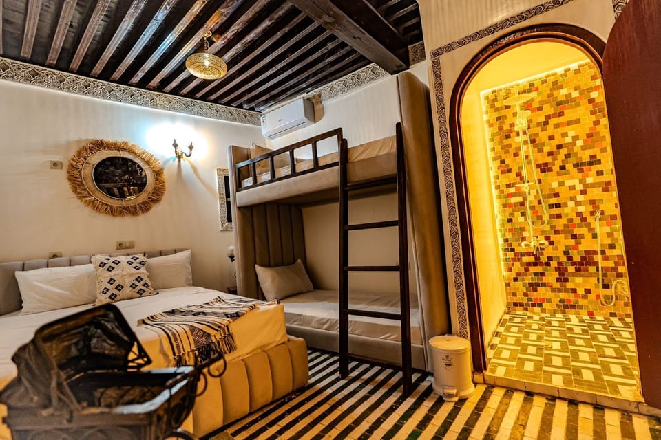 Deluxe Quadruple Room, Courtyard View | Laptop workspace, WiFi (free)