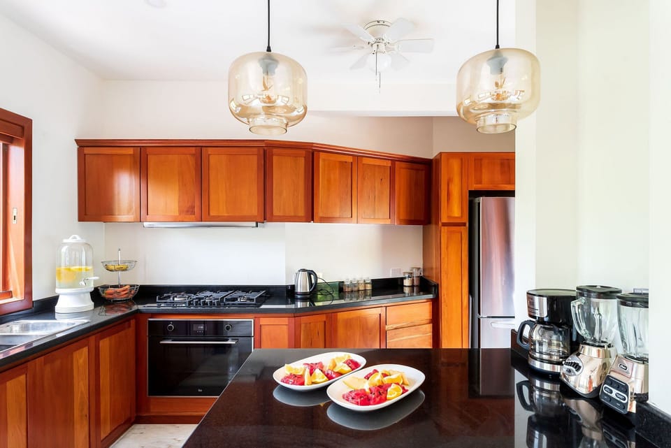 Luxury Villa | Private kitchen | Full-size fridge, microwave, oven, stovetop