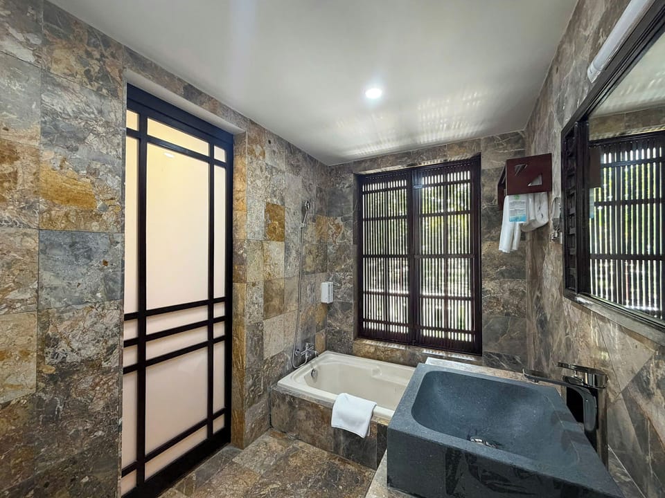 Standard Double Room | Bathroom | Combined shower/tub, hair dryer, towels, soap