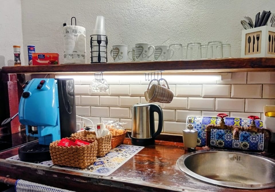 Family Apartment, Patio | Private kitchen | Espresso maker, coffee/tea maker, electric kettle