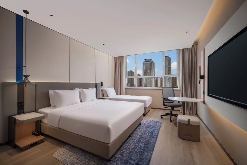 Premium bedding, down comforters, desk, laptop workspace