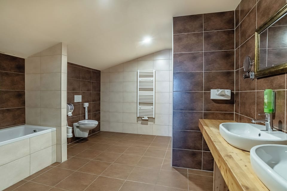 Superior Room, 2 Bedrooms, Balcony, Mountain View | Bathroom | Hair dryer, towels, soap, shampoo
