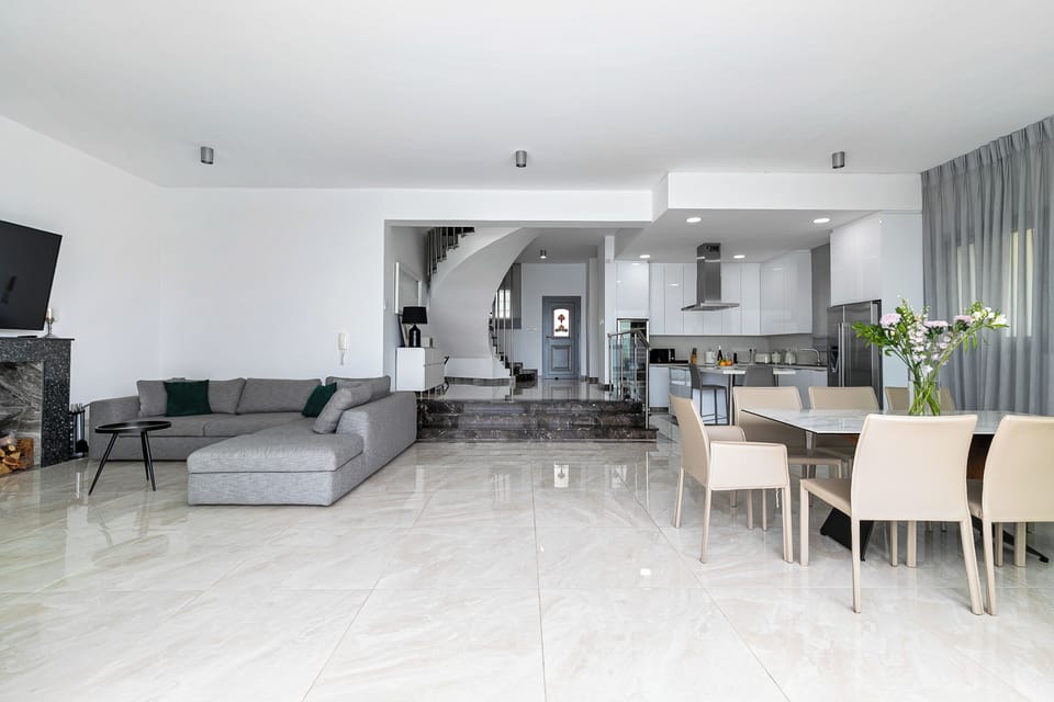 Luxury Villa, 3 Bedrooms, Sea View, Beachfront | Living area | 85-inch Smart TV with digital channels, fireplace, Netflix