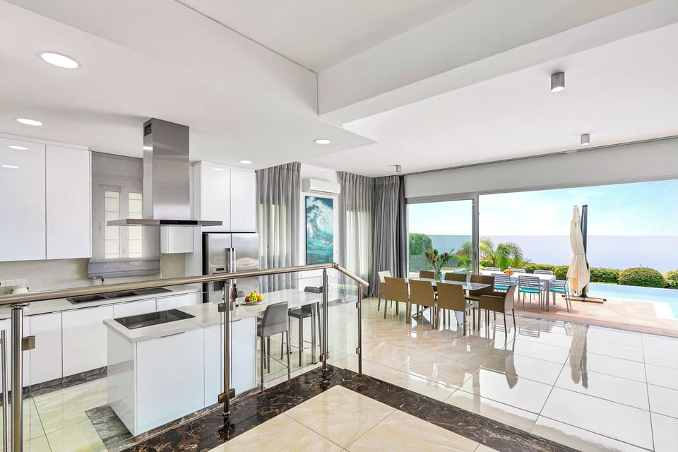 Luxury Villa, 3 Bedrooms, Sea View, Beachfront | Living area | 85-inch Smart TV with digital channels, fireplace, Netflix