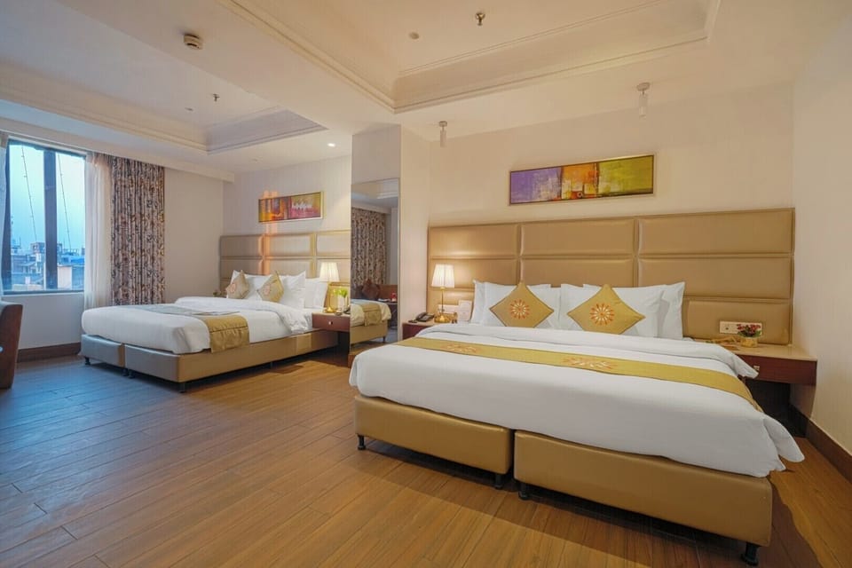 Family Room | Premium bedding, down comforters, desk, laptop workspace