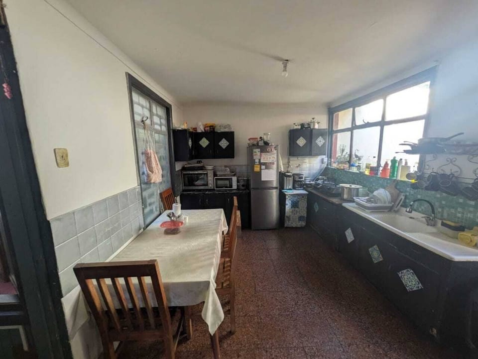Full-size fridge, microwave, oven, cookware/dishes/utensils