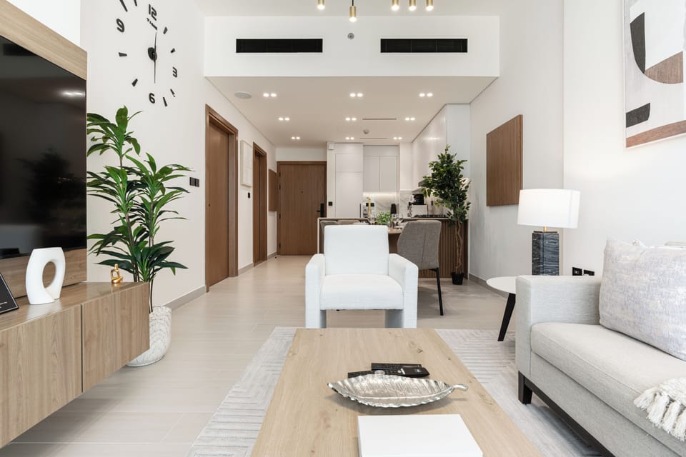 Deluxe Apartment, Balcony, City View | Living area | 55-inch Smart TV with digital channels