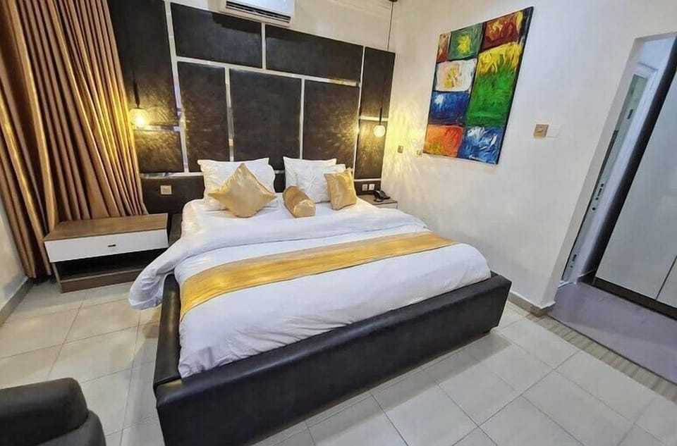 Economy Apartment, Balcony, City View | Desk, laptop workspace, blackout drapes, soundproofing