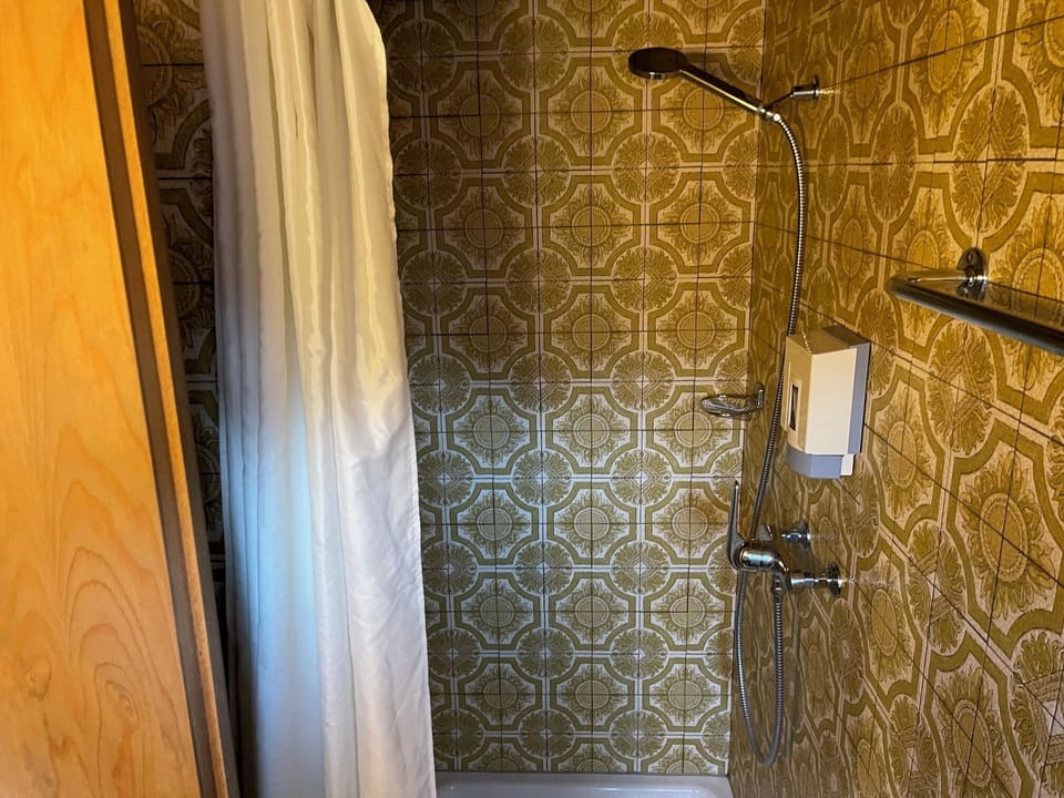 Basic Double or Twin Room, Mountain View | Bathroom | Shower, hair dryer, towels, soap