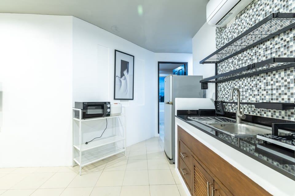 Premier Suite, 2 Bedrooms, Kitchen, Sea View | Private kitchen | Mini-fridge, electric kettle, cleaning supplies, paper towels