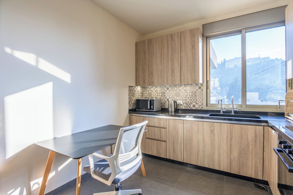 Apartment, 2 Bedrooms, Kitchen, City View | Private kitchen | Full-size fridge, microwave, oven, stovetop
