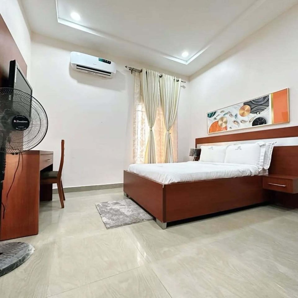 Economy Apartment, Balcony, City View | Desk, laptop workspace, blackout drapes, soundproofing