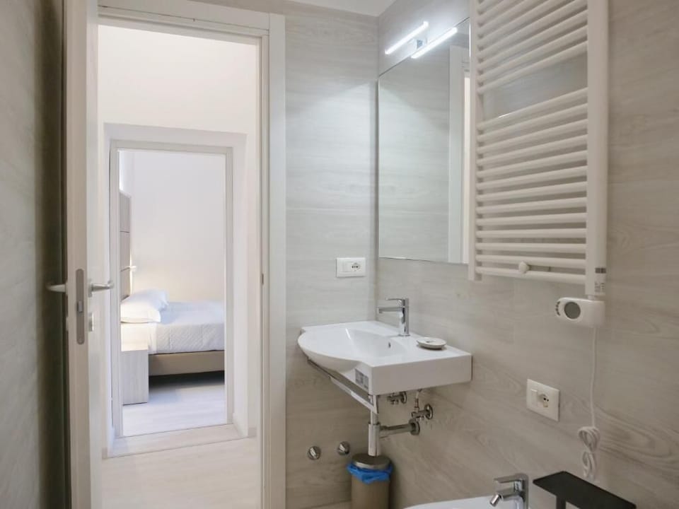 Standard Double Room, 1 Double Bed | Bathroom | Shower, towels, soap, shampoo
