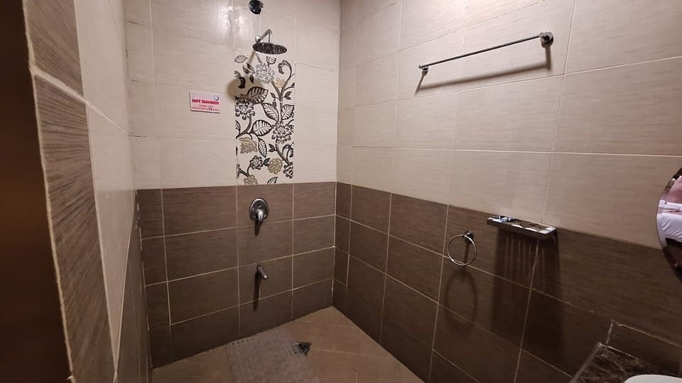 Shower, slippers, towels, soap