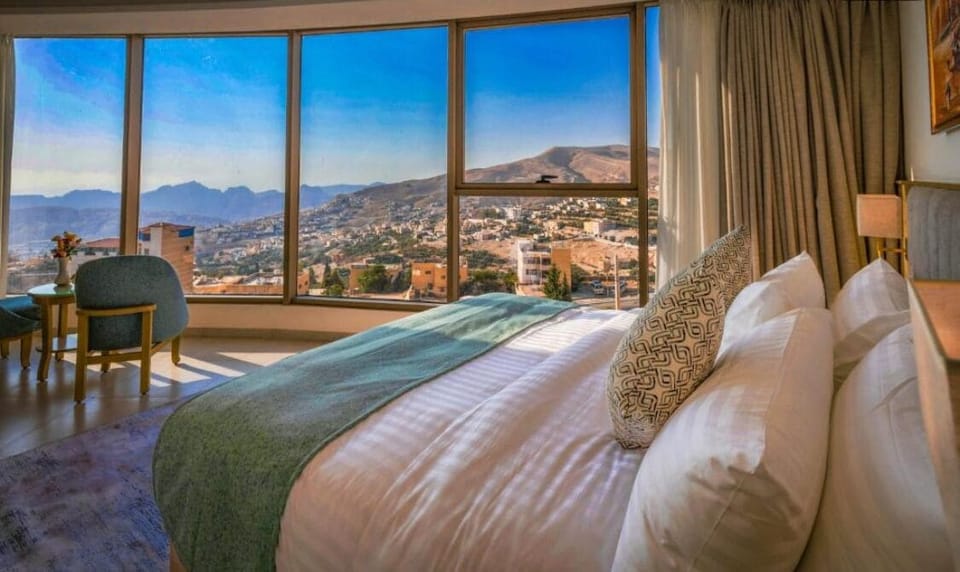 Family Suite, Balcony, Mountain View | Frette Italian sheets, premium bedding, down comforters