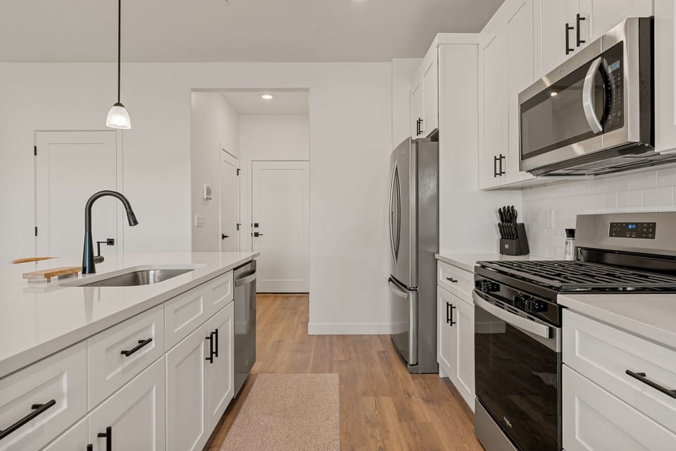 Townhome, 4 Bedrooms | Private kitchen | Coffee/tea maker, fridge, oven, toaster