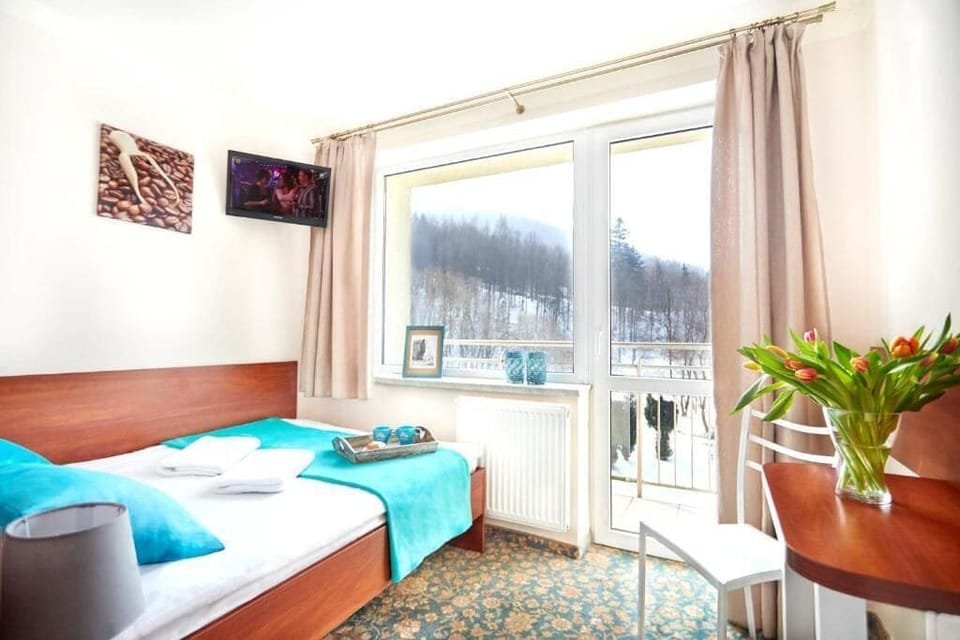 Economy Double Room, Balcony, Garden View | Laptop workspace, free WiFi
