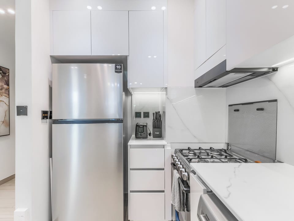Apartment, Balcony, City View | Private kitchen | Espresso maker, electric kettle
