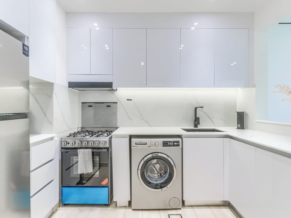 Apartment, Balcony, City View | Private kitchen | Espresso maker, electric kettle