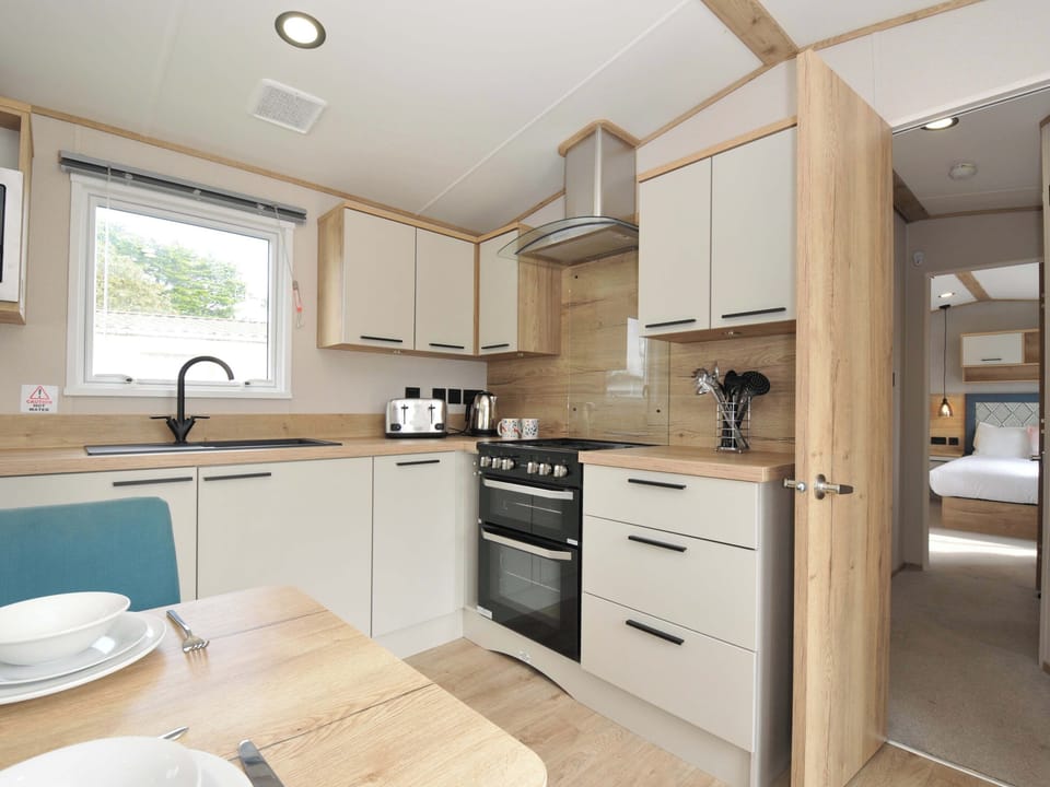 Fridge, microwave, toaster, cookware/dishes/utensils