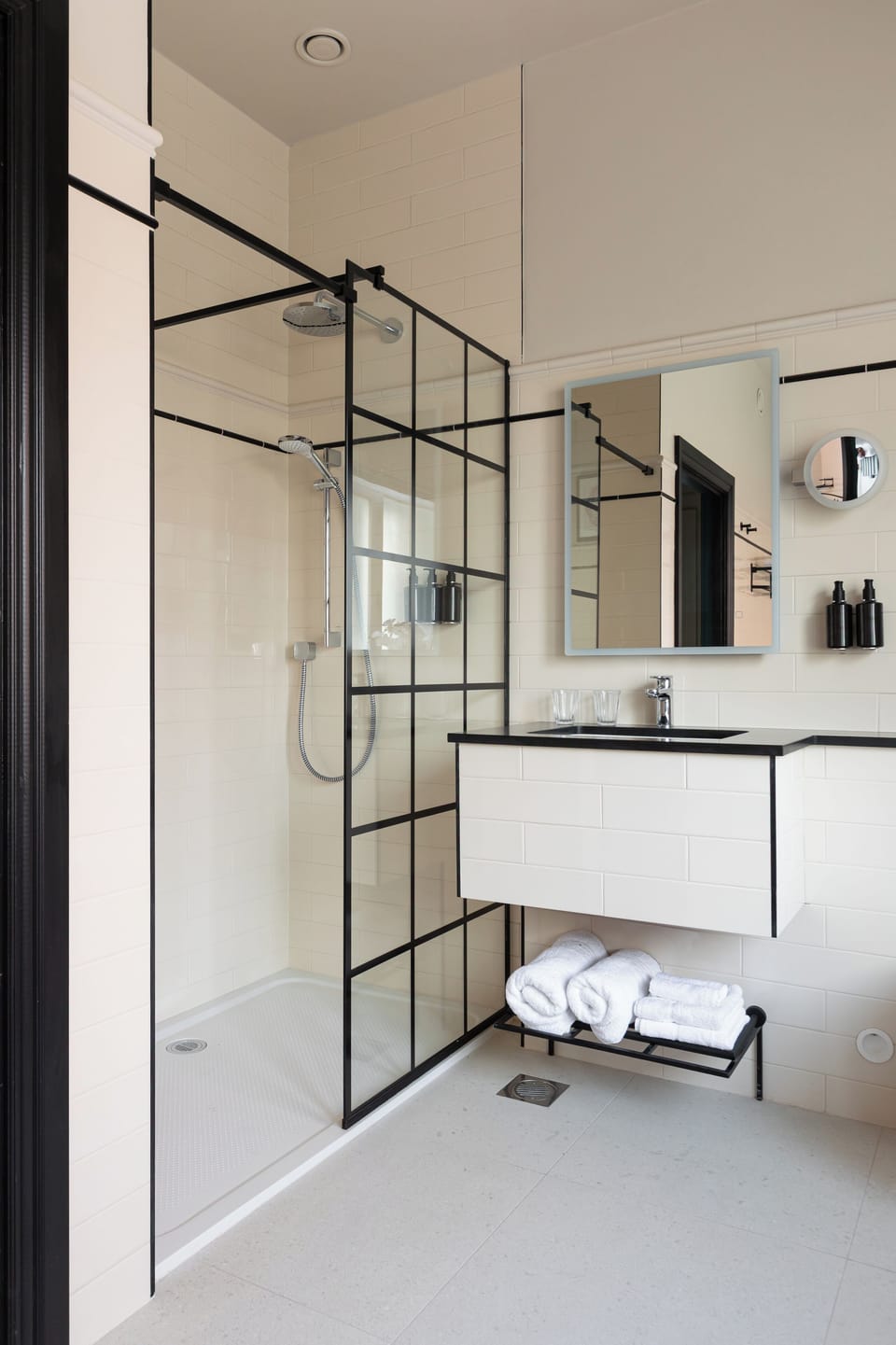 Designer toiletries, hair dryer, bathrobes, slippers