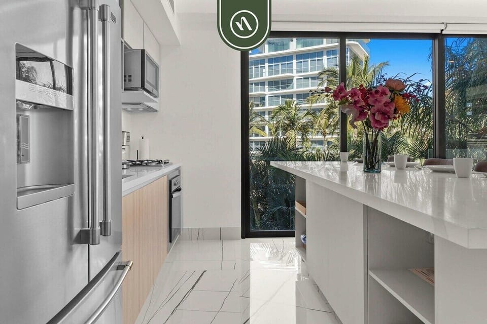 Apartment, Multiple Beds, Jetted Tub, Beach View (Udara 1F) | Private kitchen | Coffee/tea maker