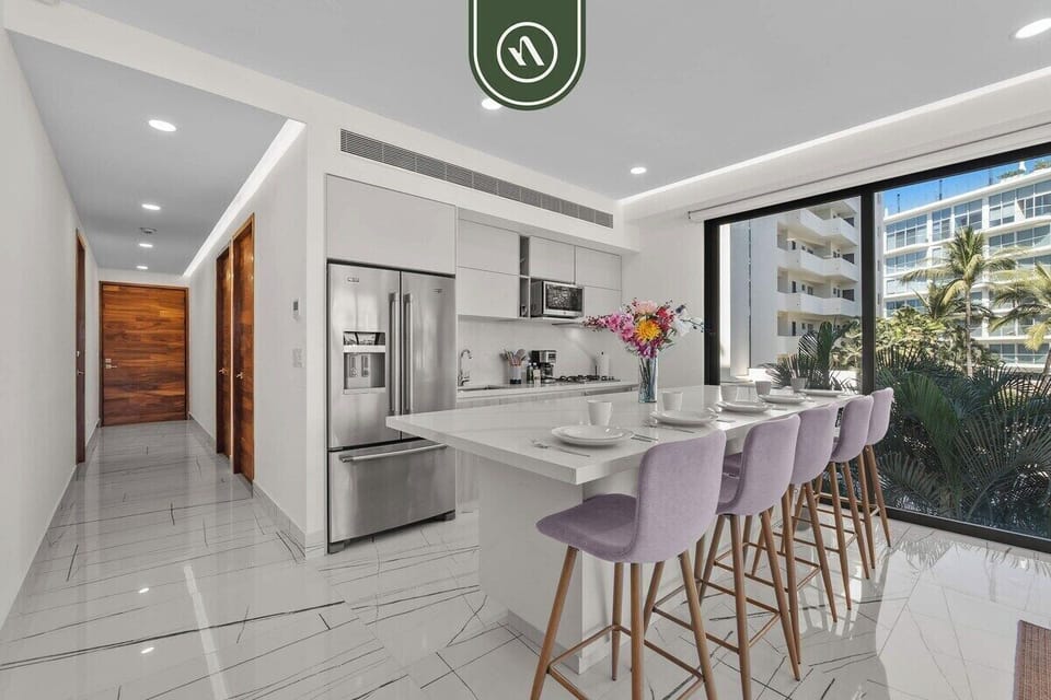Apartment, Multiple Beds, Jetted Tub, Beach View (Udara 1F) | Private kitchen | Coffee/tea maker