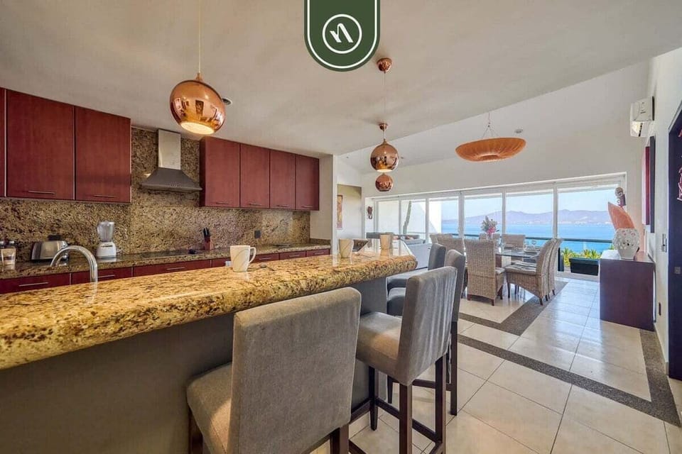 Apartment, Multiple Beds, Pool Access, Ocean View (Villa Magna 294) | Private kitchen | Dining tables