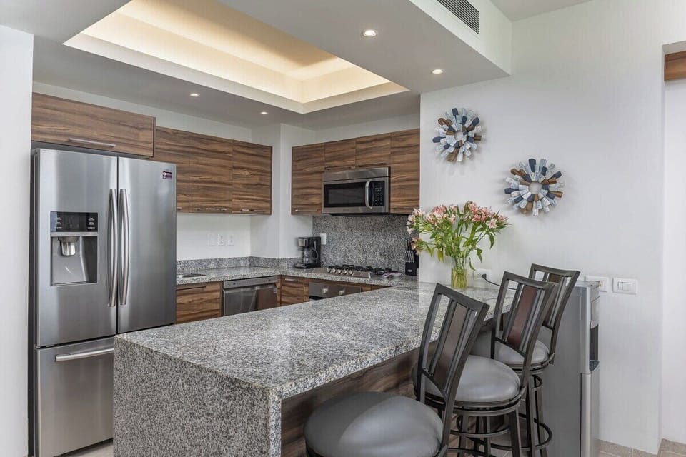 Condo, Multiple Beds, Hot Tub, Ocean View (Alamar Delta I 902) | Private kitchen | Electric kettle