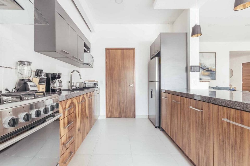 Condo, Multiple Beds, Pool Access, Beach View (DellaTerra 1A) | Private kitchen