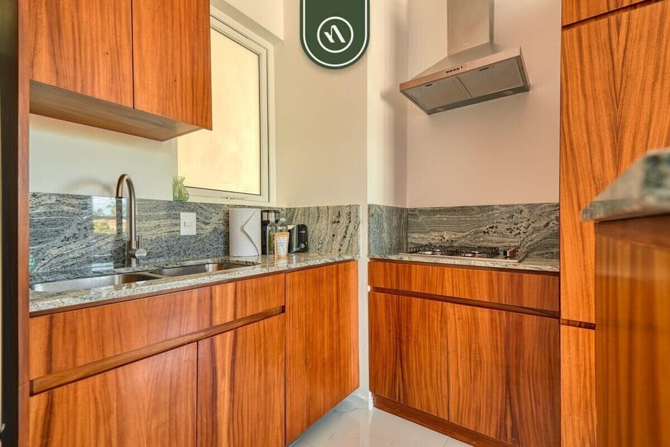 Apartment, Multiple Beds, Balcony (Grand Trianon 405) | Private kitchen | Dining tables