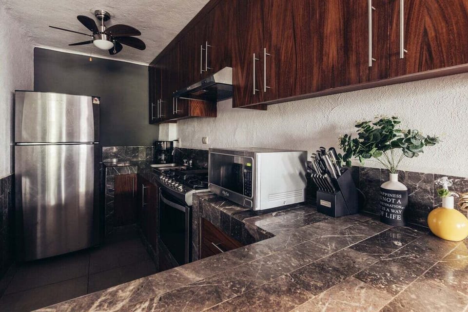 Condo, Multiple Beds, Terrace, Ocean View (La Palapa 106) | Private kitchen