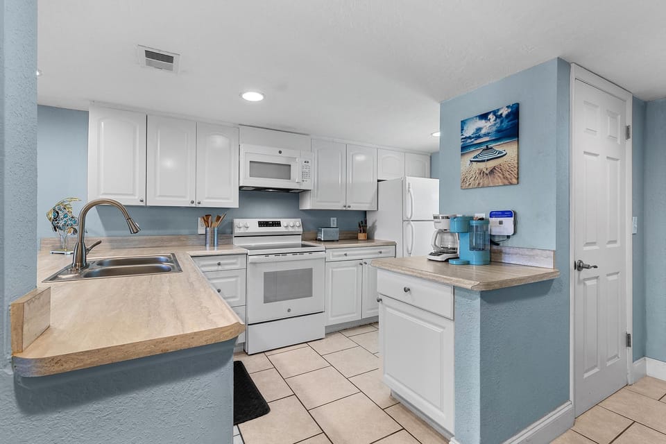 Condo, Multiple Beds (Point East 320) | Private kitchen