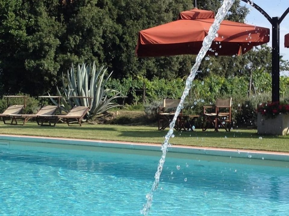 Seasonal outdoor pool, a waterfall pool