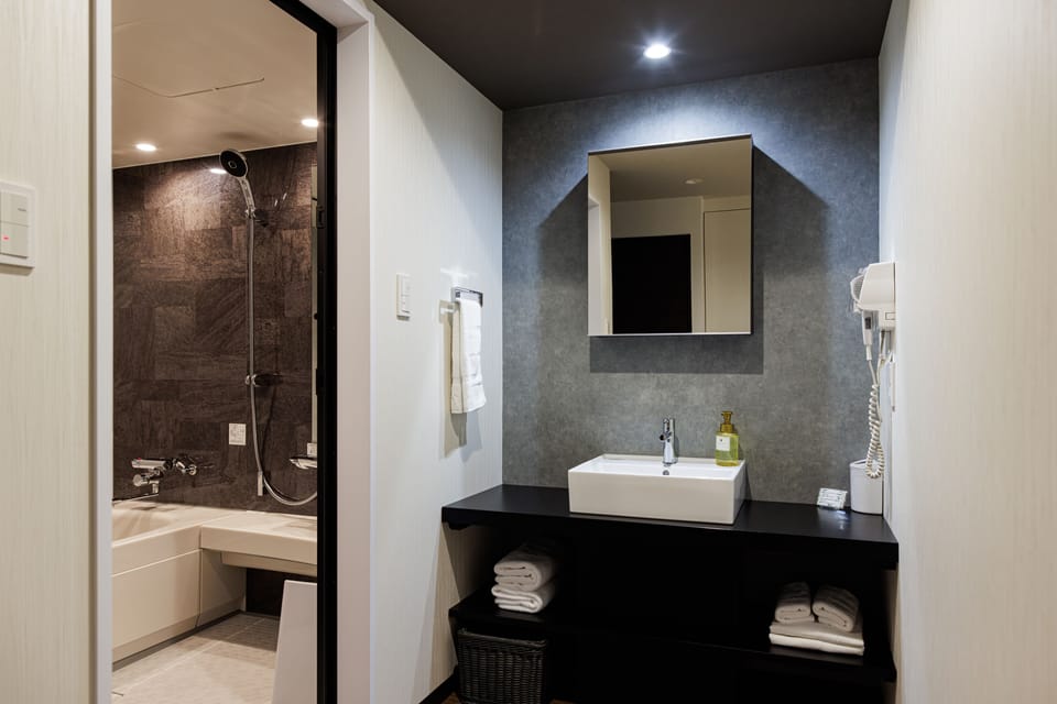 Basic Twin Room, Non Smoking | Bathroom | Separate tub and shower, deep soaking tub, free toiletries, hair dryer