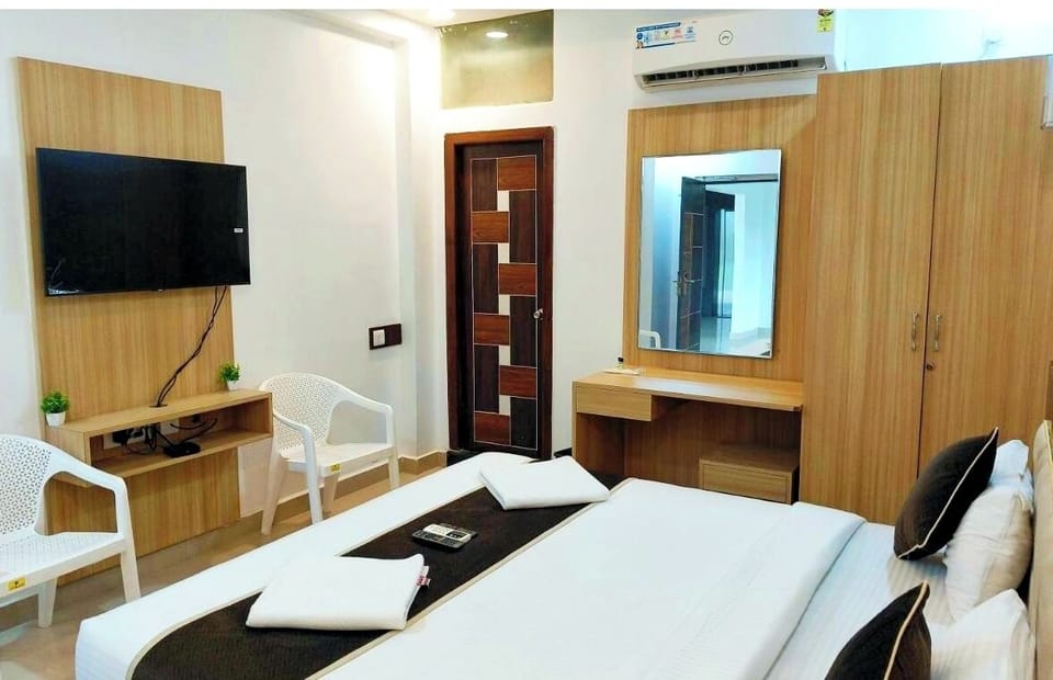Premium bedding, desk, laptop workspace, soundproofing