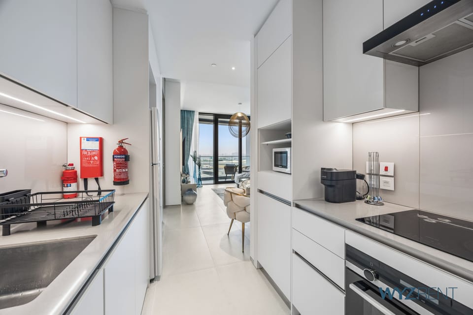 Luxury Apartment, 1 Bedroom, Canal View | Private kitchen | Coffee/tea maker, electric kettle, highchair