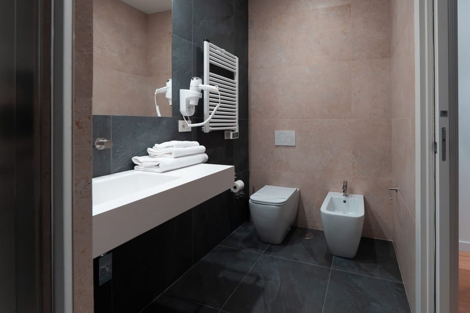Shower, hair dryer, slippers, bidet