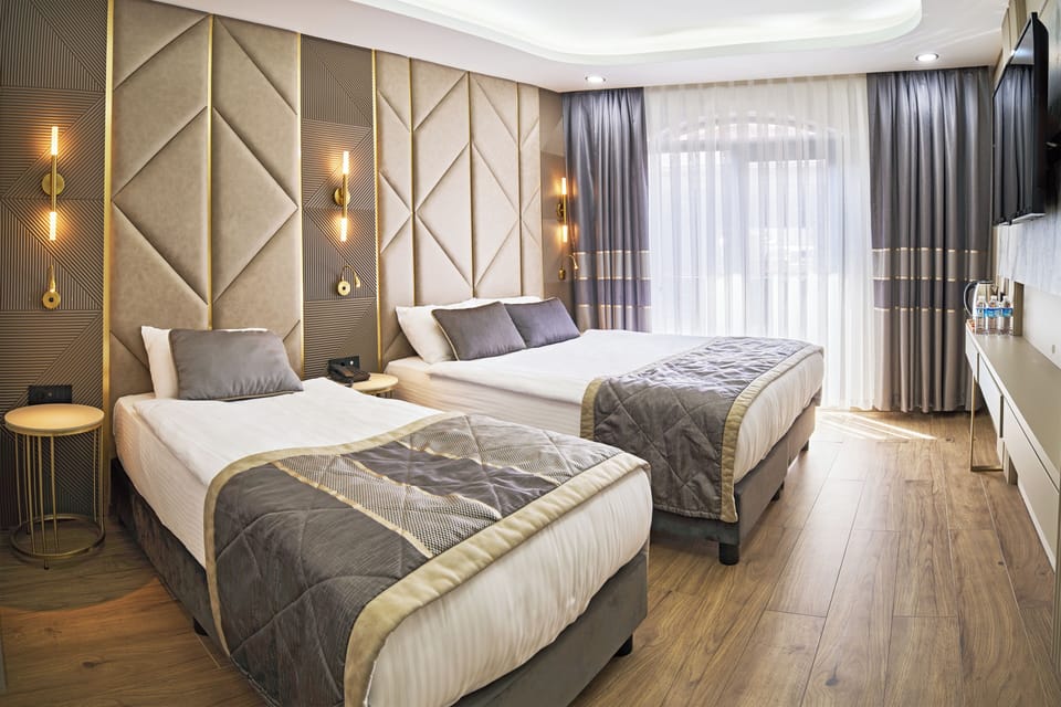 Standard Triple Room, City View | Egyptian cotton sheets, premium bedding, memory foam beds, minibar