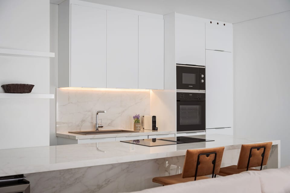 Deluxe Apartment, Balcony, City View | Private kitchen | Full-size fridge, microwave, oven, stovetop